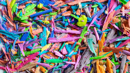 colored shavings from pencil sharpening, background or textureの写真素材