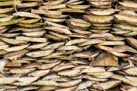 pile of lumber planks for wallpaper or textureの写真素材