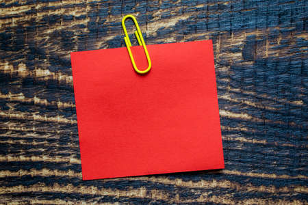 space for text, blank note on a notice board. autumn background with leavesの写真素材