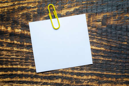 space for text, blank note on a notice board. autumn background with leavesの写真素材