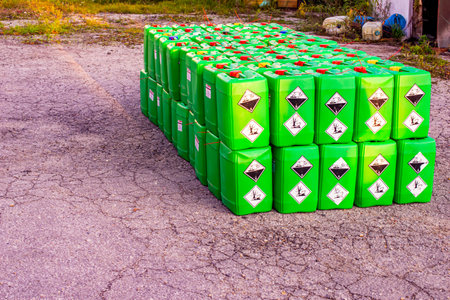 Green plastic drums with chemicals set in the squareの写真素材
