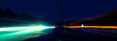 Night road lights. Lights of moving cars at night. long exposure red, blue, orange, multicolored