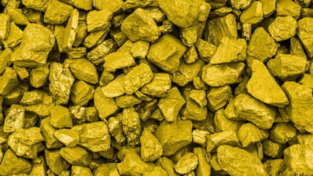 golden stones background, macro shot on tapeteの写真素材