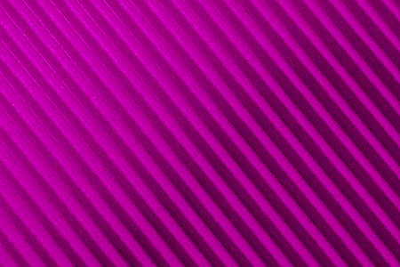 red, orange striped background of a corrugated cardboard