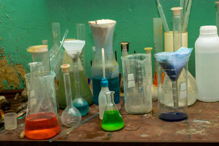 Chemical lab, you can see beakers and flasks on the tableの写真素材