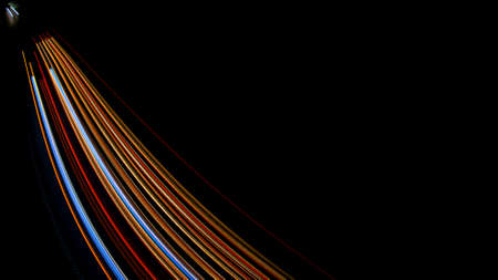 Night road lights. Lights of moving cars at night. long exposure red, blue, green