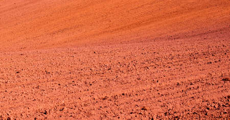 background of a plowed agricultural field