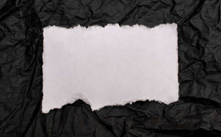 white blank note on crinkled notice board