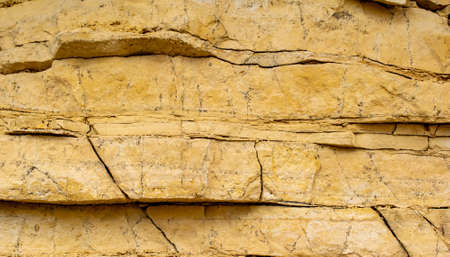 quarry wall, background or texture with stones, limestone, dolomite
