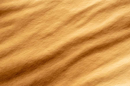 old wrinkled yellowed paper for vintage backgroundの写真素材