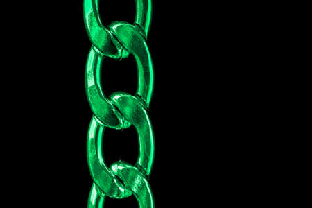 green chain links on black background.の写真素材