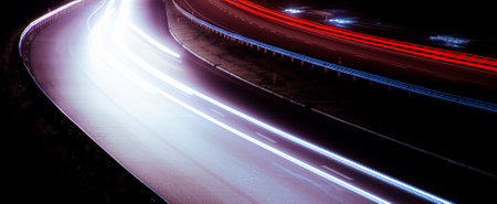 Night road lights. Lights of moving cars at night. long exposure red, blue, green, orange.