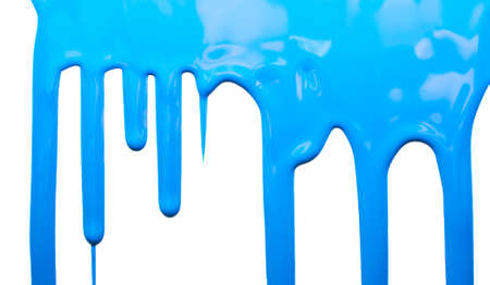 pouring paint on a white wallの写真素材