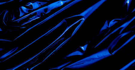 wavy foil, reflections of light, artistic background