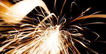 sparks in the dark. lines of light.