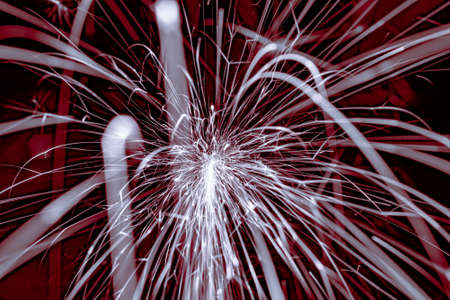 lines of light. sparks in the darkの写真素材