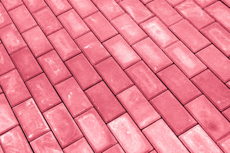 red cement paving stones laid diagonallyの写真素材