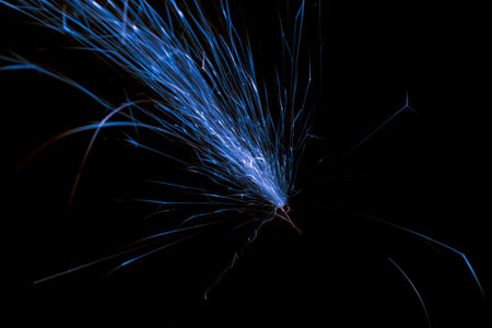 lines of light. sparks in the darkの写真素材