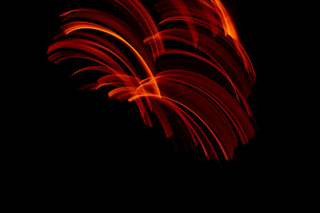 burning in motion. lines of fire in the dark