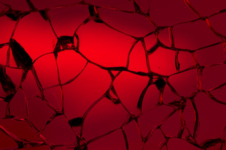 cracked glass. broken glass background or textureの写真素材