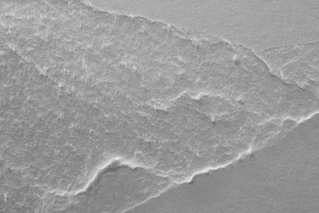 edge of a torn white sheet of paper on a black background, black holeの写真素材