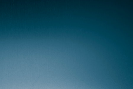 smooth metal sheet background or textureの写真素材