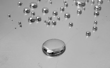 mercury toxic metal, spilled drops of mercuryの写真素材