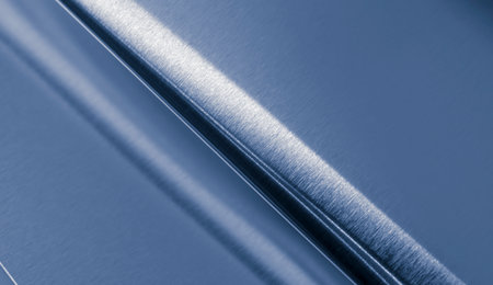 bent metal sheet with visible texture. backgroundの写真素材