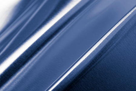 bent metal sheet with visible texture. backgroundの写真素材