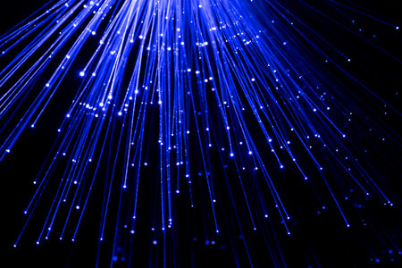 Fiber optical cables glowing blue