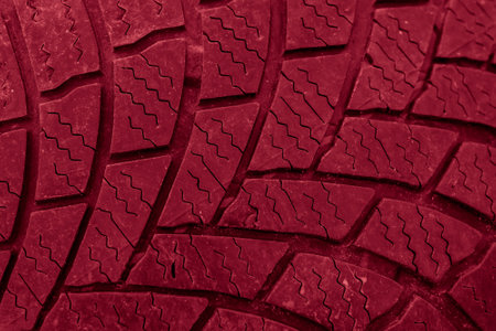 tire tread, tire traces background redの写真素材