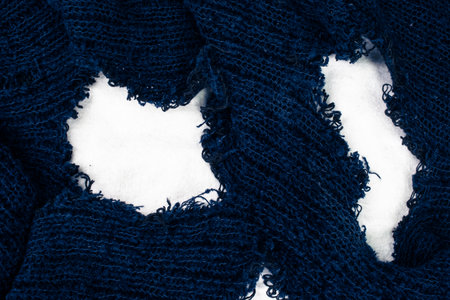 blue old wool sweater with holes