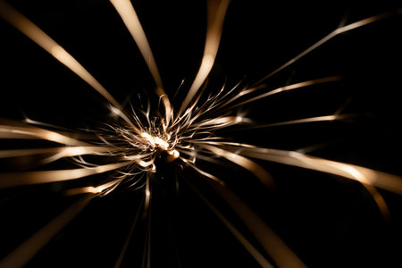 sparks from the glowing in the dark straight aheadの写真素材