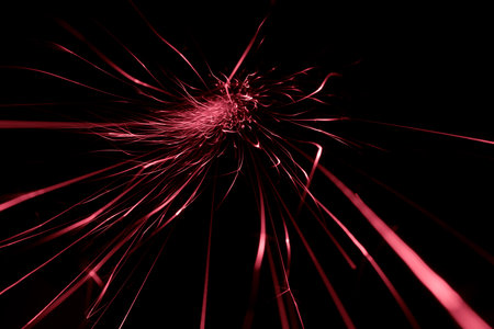 red sparks glowing in the dark straight aheadの写真素材