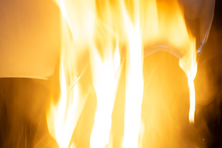 burning plastic close up, plastic is burning, melts and dripsの写真素材