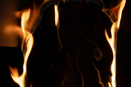 burning plastic close up, plastic is burning, melts and dripsの写真素材