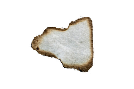 a piece of burnt rag on a white backgroundの写真素材