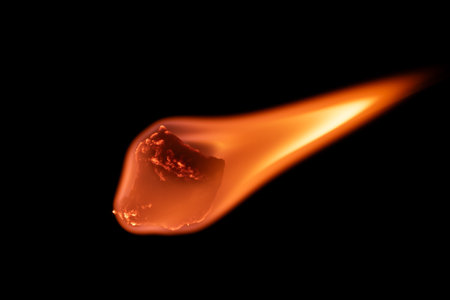 a burning meteorite with a tail of flamesの写真素材
