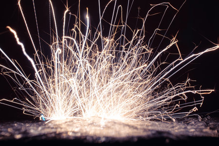 explosion of sparks from an electrical short circuitの写真素材