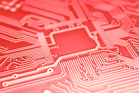 printed red orange circuit board. layout of tracksの写真素材