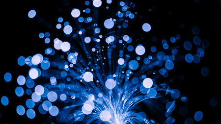 Fiber optical cables glowing blue. bokeh light spots