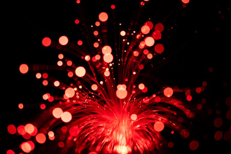 Fiber optical cables glowing red. bokeh light spots