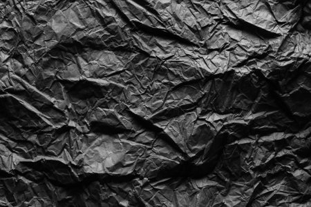 black crinkled paper for backgroundの写真素材