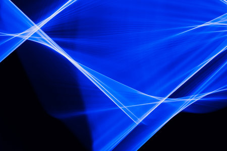 laser light blue. streaks of light rippling and twisting.の写真素材