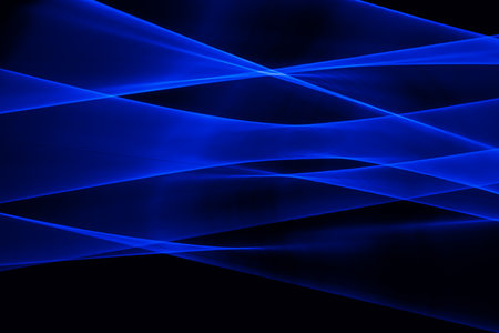 laser light blue. streaks of light rippling and twisting.の写真素材