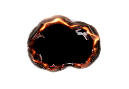 burning paper. isolated burn holeの写真素材