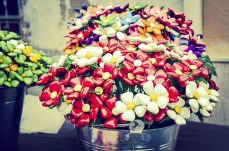 Bouquet with batterflies made from jelly candies in marketの写真素材