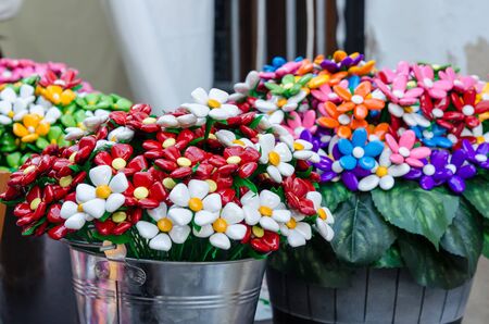 Bouquet with batterflies made from jelly candies in marketの写真素材