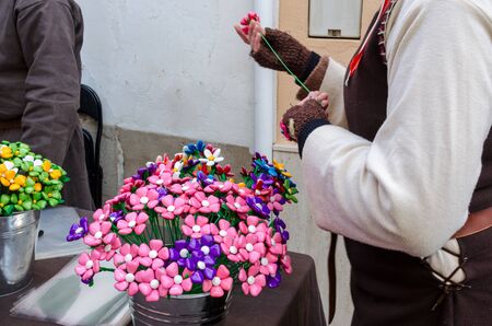 Bouquet with batterflies made from jelly candies in marketの写真素材