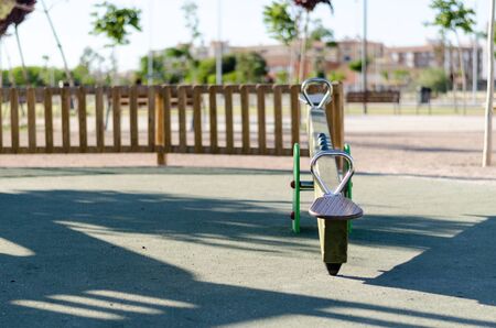 Children's playground swing in the park .の写真素材